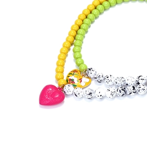 Colorful beaded necklace with magenta embossed and floral enamel heart pendants
