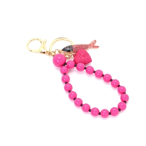 Pink beaded keychain with enamel tropical fish pendant and carved heart charm for bags