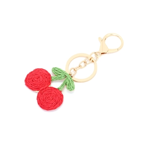 Handmade woven cherry keychain with red berries, green leaves and golden metal lobster clasp