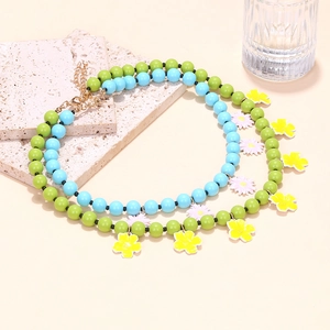 Bohemian multilayer colorful beaded necklace with small flower pendants and golden clasp