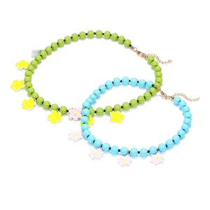 Bohemian multi-layer beaded necklace with colorful enamel flowers and gold clasp