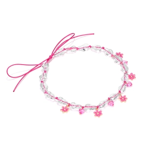Handmade summer beaded necklace with pink flower and heart pendant on white background