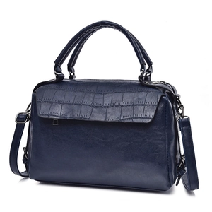 Navy blue crocodile embossed Boston handbag with adjustable shoulder strap and top handles