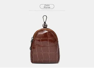 Detailed macro view of a brown crocodile pattern leather coin purse with metal hook