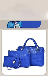 Detailed view of 3-in-1 blue faux leather handbag set with quilted circle pattern
