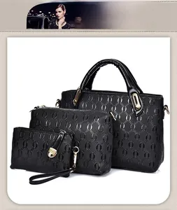 Three-piece black handbag set with chain texture embossing and gold metal details