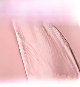 Macro shot of waterproof pink nylon fabric detail for sports gym bag with fine texture