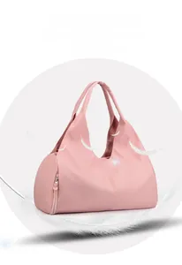 Pink waterproof fitness bag showing comfortable double handles and lightweight design