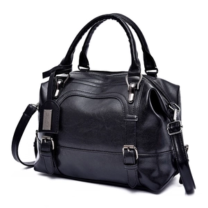 Black oil wax leather boston handbag with top handles and adjustable shoulder strap