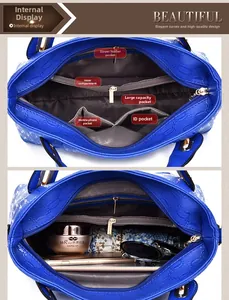 Interior view of blue crossgrain leather handbag with multiple functional pockets