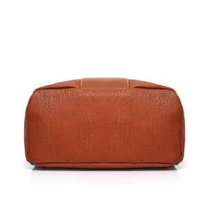 Brown textured leather backpack with rounded base and smooth metallic zipper details