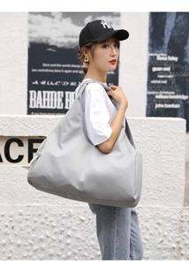 Light gray high-capacity fitness bag for sports with wet dry separation and shoe pocket