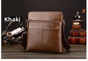 Detail of khaki vertical shoulder bag with smooth leather texture and metal zipper