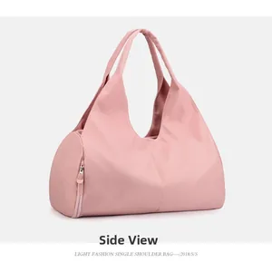 Side view of pink waterproof fitness bag showing the functional zipper pocket detail