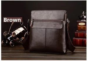 Detailed shot of brown leather messenger bag featuring front zipper and adjustable strap