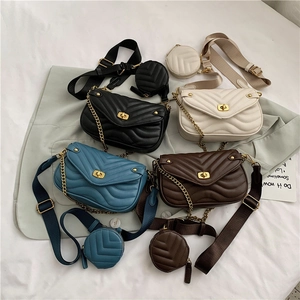Quilted crossbody bags set in four colors with chain detail and matching mini coin purse
