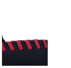 Macro shot of black frosted leather texture and red elastic webbing with stitching detail
