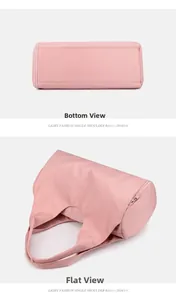 Detailed flat view of pink gym bag showing the reinforced bottom and smooth zippers