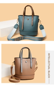 Detail of stylish bucket bags featuring contrasting straps and high-quality leather texture