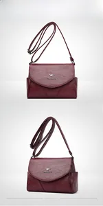 Vues de face et de profil du sac bandoulière en cuir bordeaux avec logo kangourou