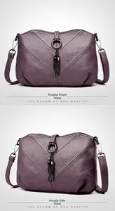 Détail du sac à bandoulière violet avec coutures en V et pendentif à pampille métallique