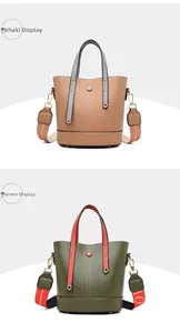 Detail of khaki and green bucket bags featuring stylish wide contrast shoulder straps