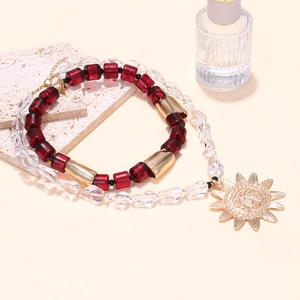 Bohemian double-layer necklace with sun pendant, red beads and gold faceted crystals