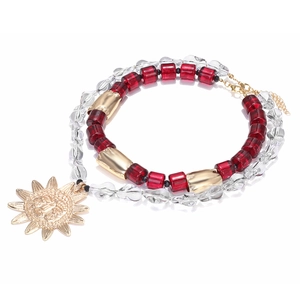 Bohemian multilayer beaded necklace with sun pendant featuring red and clear geometric beads