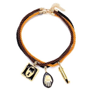 Retro punk multilayer rope necklace set with lock and hand pendants on white background