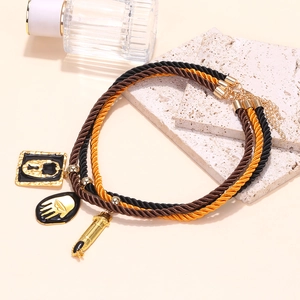 Bohemian multilayer braided rope necklace with lock, palm, and bullet pendants