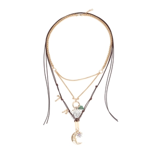 Vintage multi-layer necklace with celestial sun moon star pendants and bohemian charms