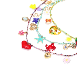 Colorful multi-layer woven cord necklace with beach-themed heart and starfish charms