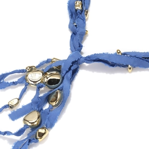 Handmade woven long necklace with dark blue fabric and gold geometric metal pendants