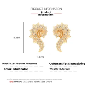 Detailed dimensions of gold seahorse earrings with rhinestones measuring 6.1cm by 3.8cm