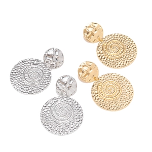 Vintage gold and silver spiral round drop earrings with hammered texture and retro design