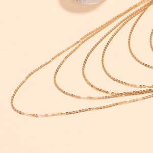 Statement multi-layer gold waterfall fringe necklace with layered curb chains