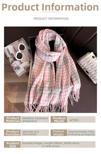 Detail view of pink and grey houndstooth scarf with tassels on a lifestyle background