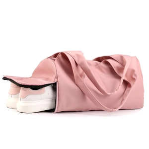 Pink waterproof fitness bag with separate shoe compartment for travel and gym yoga sports