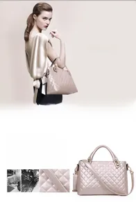 Detail of champagne gold quilted handbag featuring dual handles and metallic chain strap