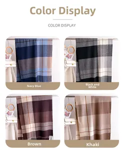 Color display of four classic plaid scarves with tassels in navy, black, brown and khaki