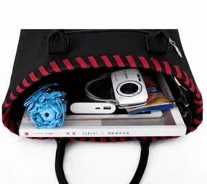 Detailed interior view of a large black tote bag showing high storage capacity