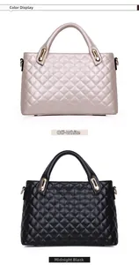 Rice white and midnight black quilted bags with diamond stitching and gold hardware