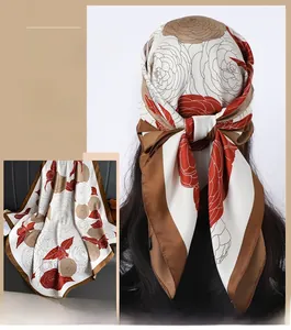 Detailed view of 90cm silk-satin scarf featuring vintage rose print and brown border