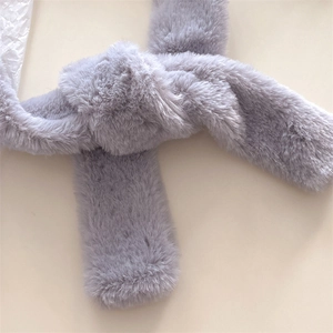 Close-up of a grey faux fur neck warmer scarf with a soft plush knotted texture