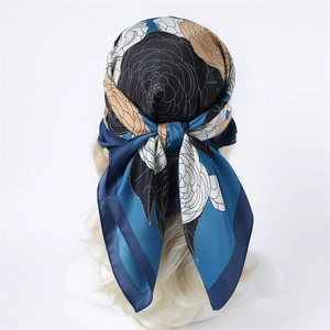 90cm silk square scarf with floral print worn as a headscarf in a back view pose