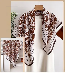 Detailed pattern of silk scarf with realistic brown roses and classic polka dots