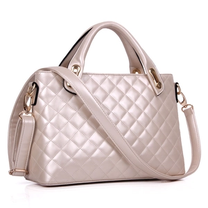 Champagne gold quilted handbag with metallic finish and detachable shoulder strap