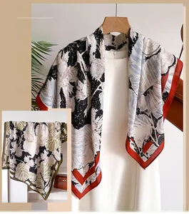 Detail of silk-feel scarf featuring vintage botanical prints and floral patterns