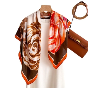 Vintage floral silk square scarf with large rose prints styled on a white dress