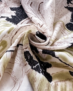 Detailed close-up of squirrel print silk scarf with abstract herringbone pattern